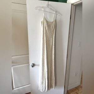 Beaded, ivory-colored spaghetti strap gown. Classic!!